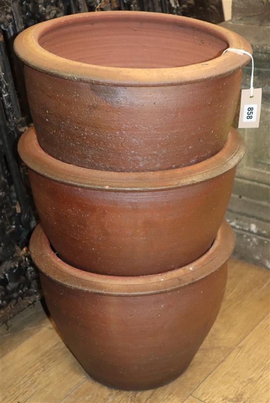 A set of three glazed pottery garden planters Diameter 40cm